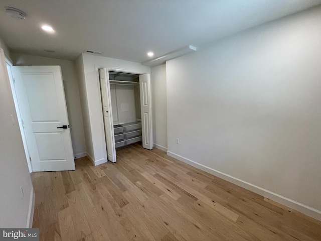 unfurnished bedroom featuring light hardwood / wood-style flooring