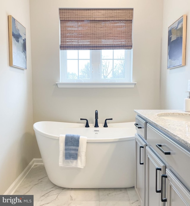 bathroom featuring a bathtub and vanity