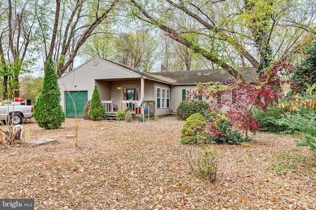 single story home featuring a garage