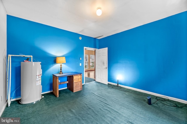 unfurnished office featuring dark colored carpet and water heater