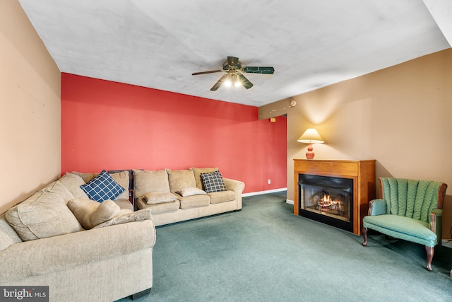 living room featuring carpet floors and ceiling fan