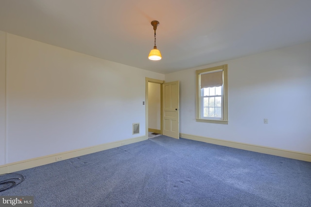 unfurnished room featuring carpet floors