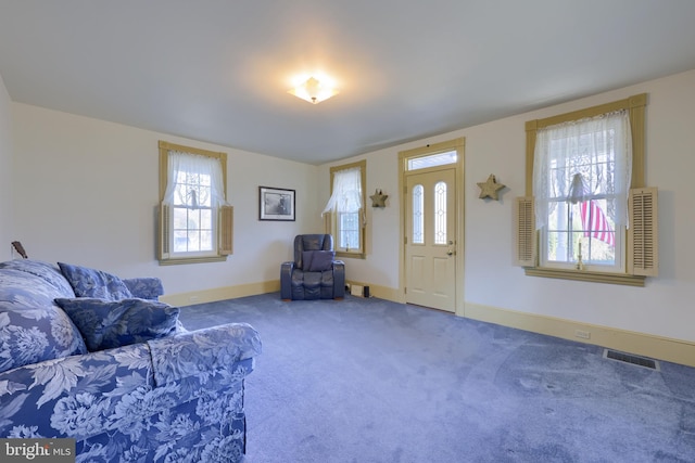 living area with carpet floors