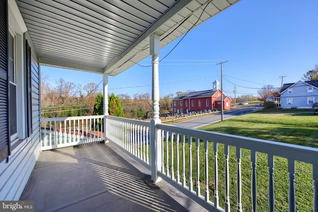 balcony featuring covered porch