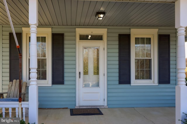 property entrance with a porch