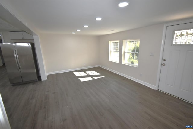 foyer entrance with dark hardwood / wood-style flooring