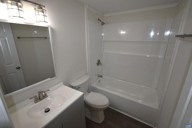 full bathroom with hardwood / wood-style flooring, vanity, toilet, and shower / bath combination