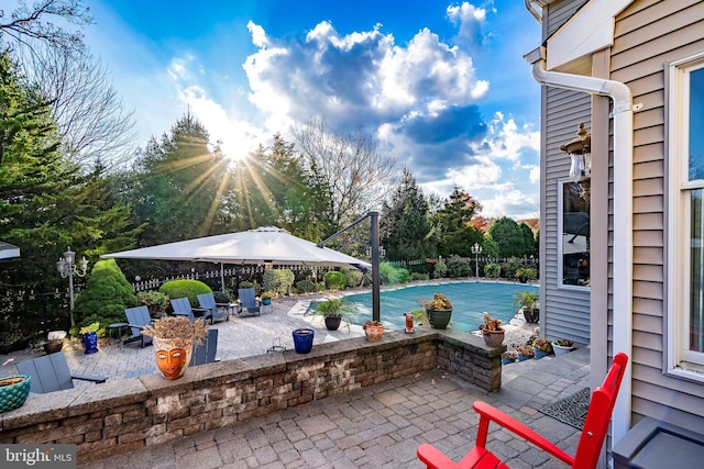 view of pool featuring a patio