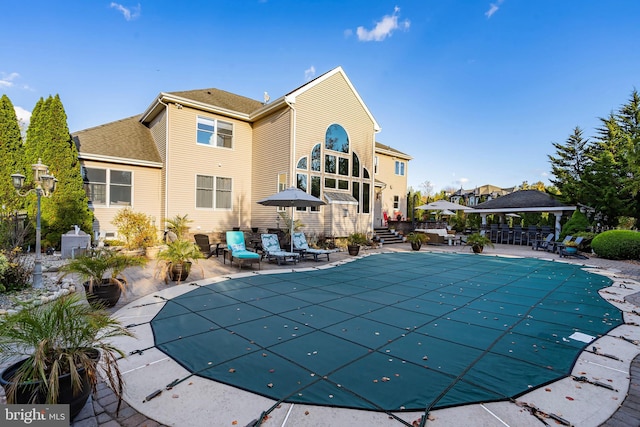 view of swimming pool with a patio area