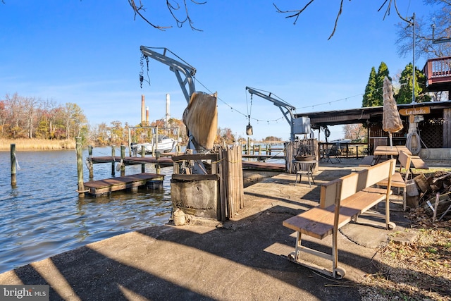 dock area with a water view