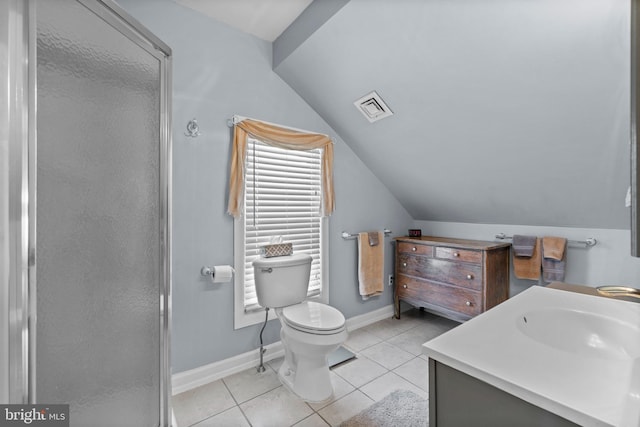 bathroom with tile patterned flooring, lofted ceiling, toilet, vanity, and a shower with shower door