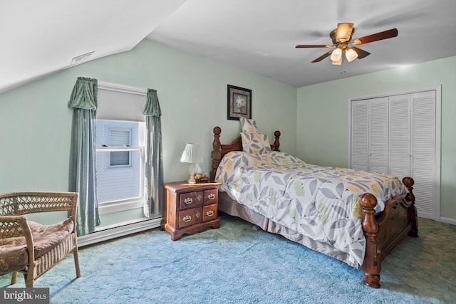 bedroom featuring ceiling fan, a closet, carpet, and vaulted ceiling