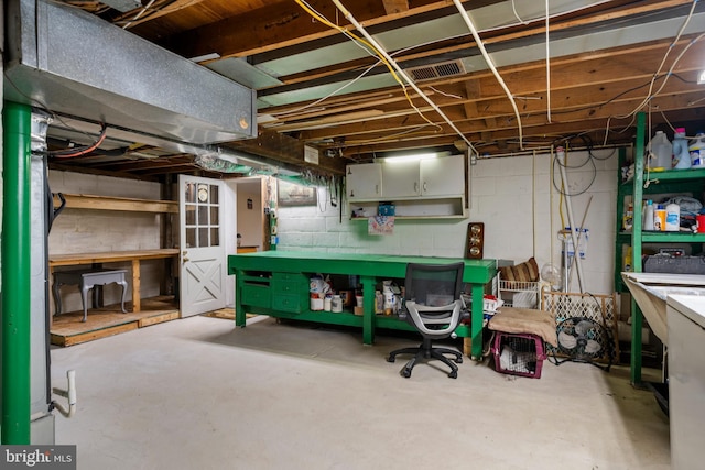 basement featuring a workshop area