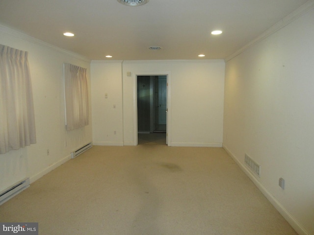 empty room featuring a baseboard heating unit, ornamental molding, and light carpet