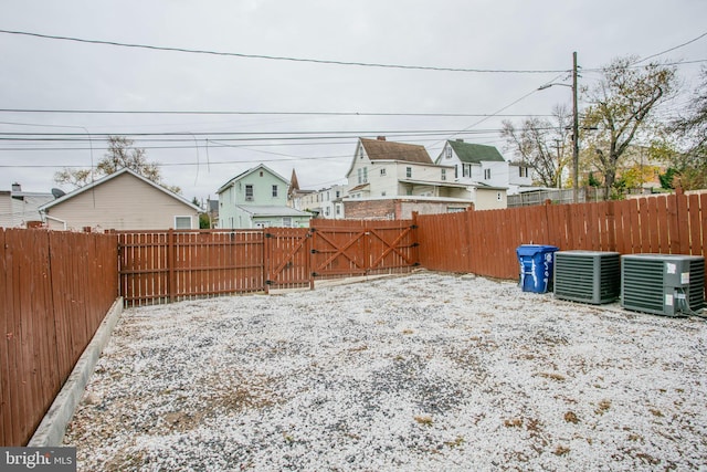 view of yard featuring central AC unit