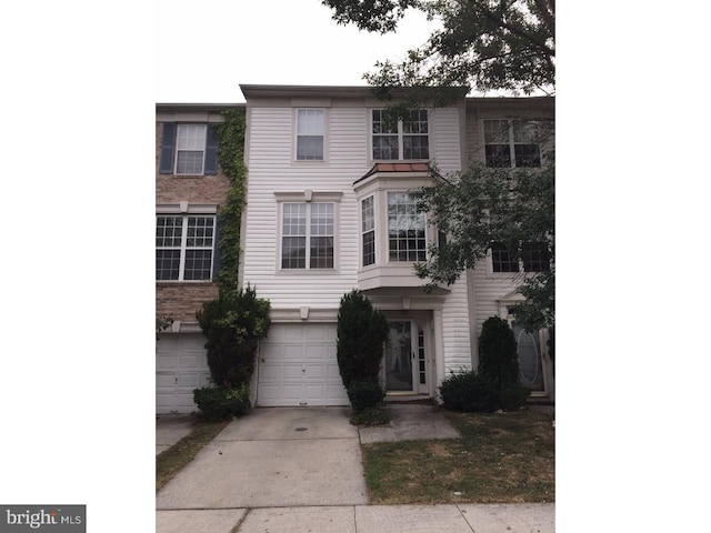 view of property featuring a garage