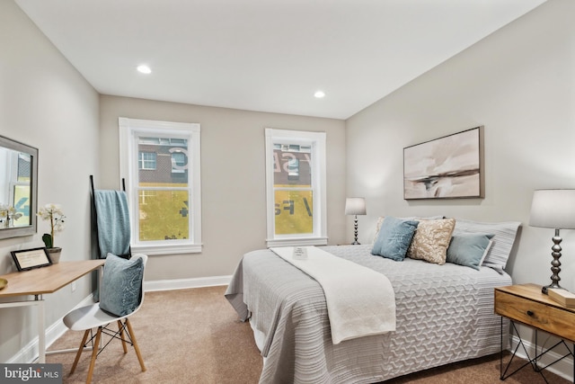 bedroom featuring carpet flooring and multiple windows