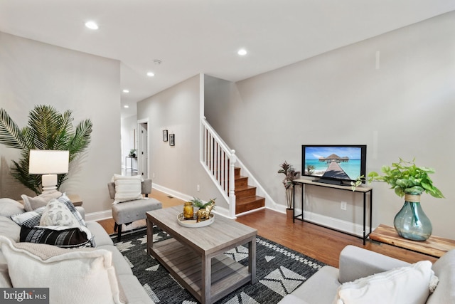 living room with dark hardwood / wood-style floors