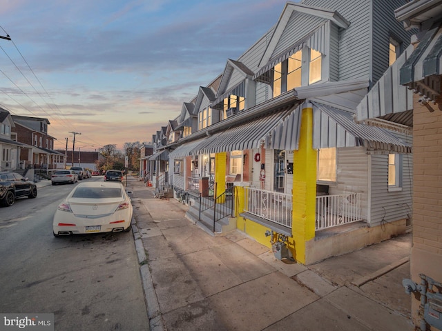 view of property exterior at dusk