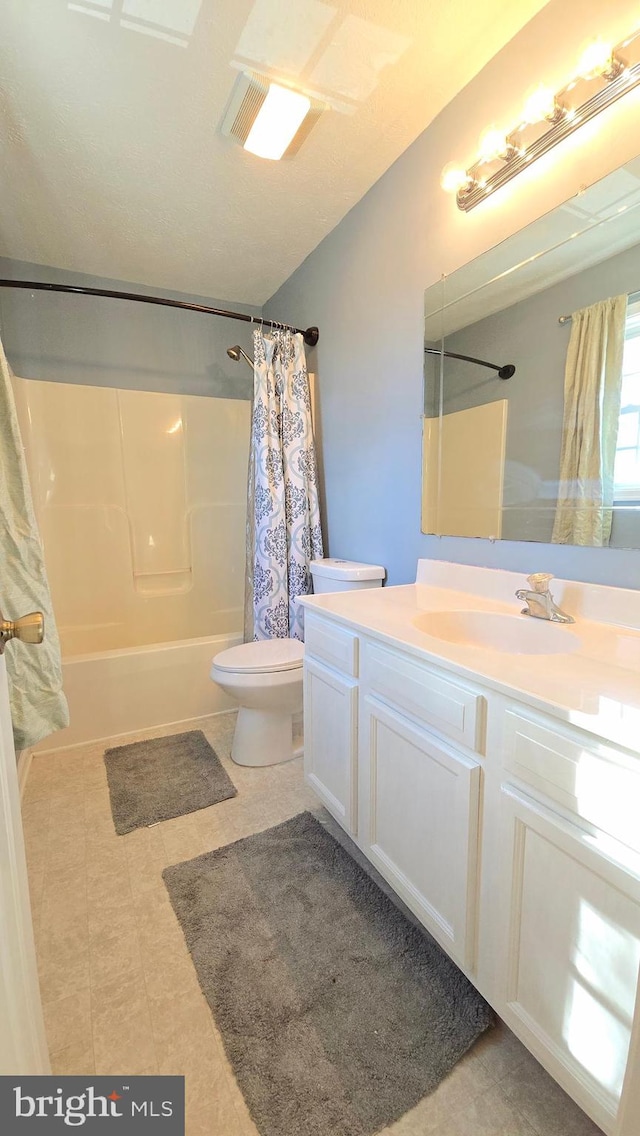 full bathroom with vanity, toilet, and shower / bathtub combination with curtain