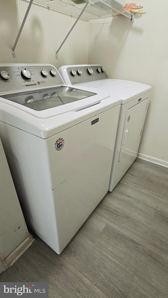 laundry area with washer and clothes dryer