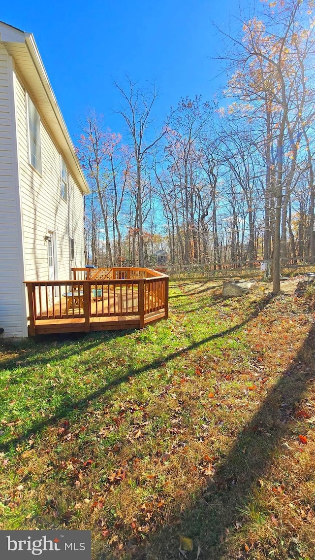 view of yard featuring a deck