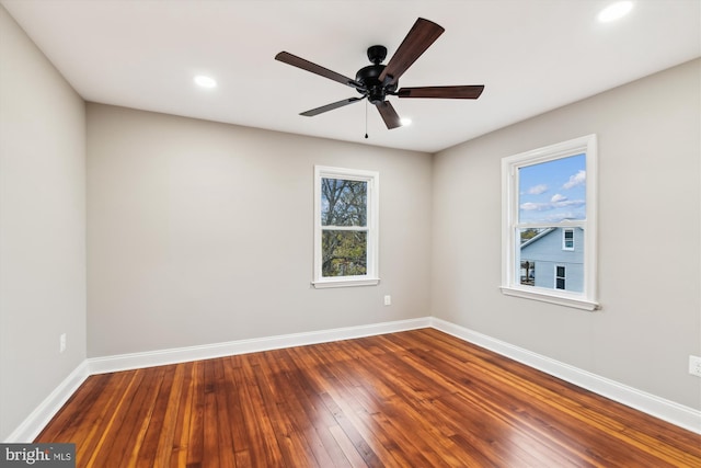 unfurnished room featuring wood-type flooring and ceiling fan