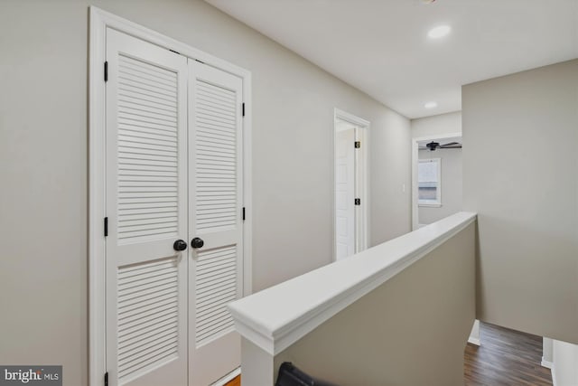 hallway featuring dark hardwood / wood-style flooring