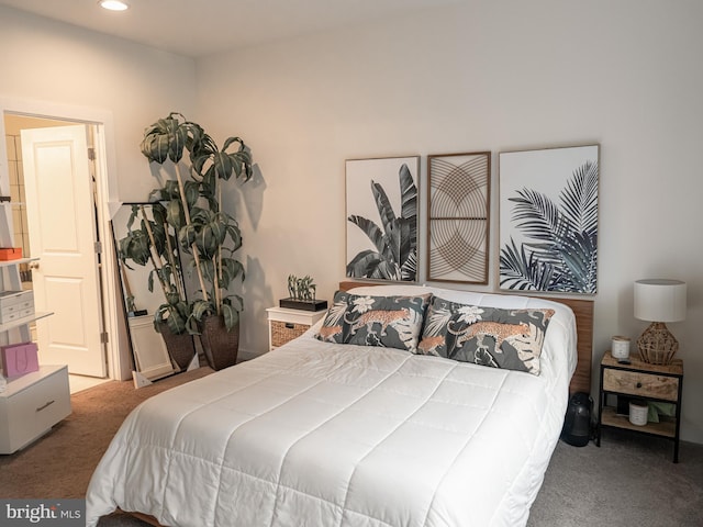 bedroom featuring carpet