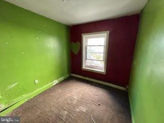 empty room featuring carpet floors