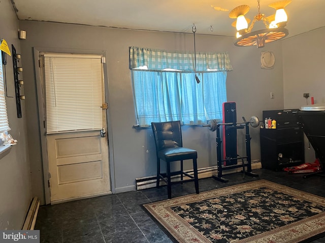 interior space with a baseboard radiator and a notable chandelier