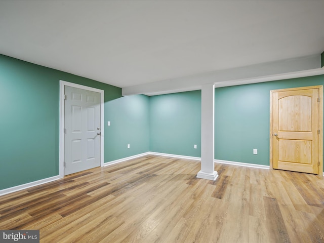 basement featuring light wood-type flooring