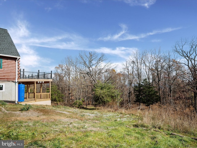 view of yard featuring a deck