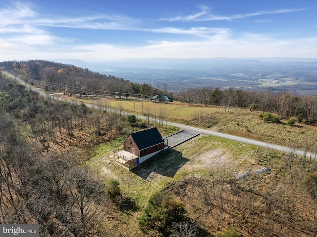 bird's eye view with a mountain view and a rural view