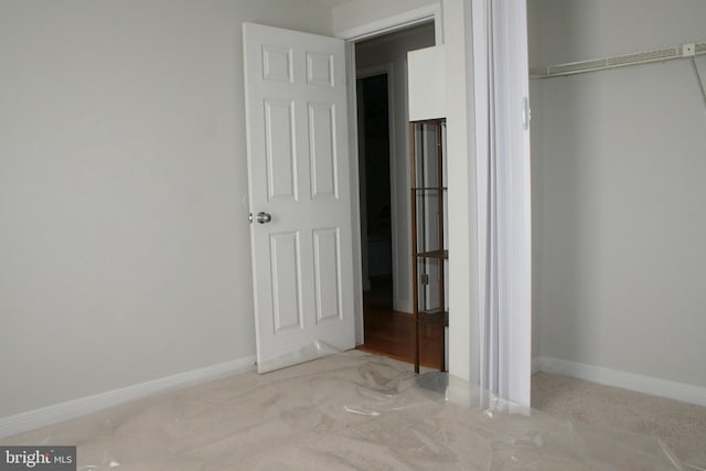 unfurnished bedroom with a closet