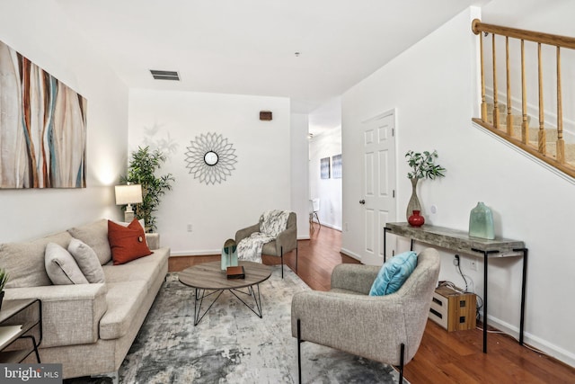 living room with hardwood / wood-style flooring