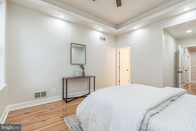 bedroom featuring ceiling fan and light hardwood / wood-style floors