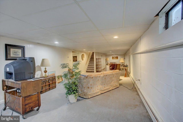 living room with carpet and a baseboard radiator