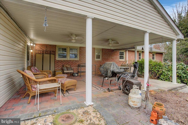 view of patio featuring an outdoor hangout area and ceiling fan