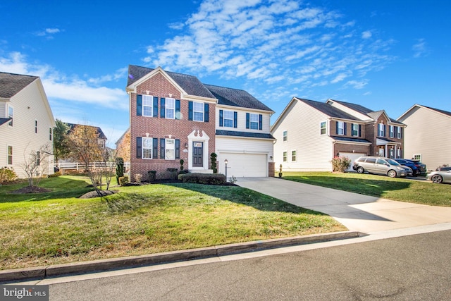 view of front of property with a garage and a front lawn