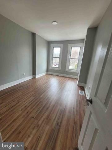 213 N Ramsey St, Philadelphia, PA 19139 - interior space featuring baseboards, visible vents, and wood finished floors