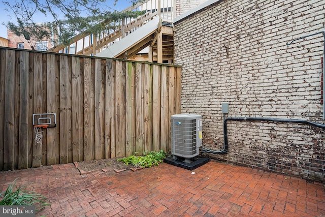 view of patio with cooling unit