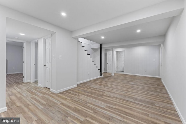 basement featuring light wood-type flooring