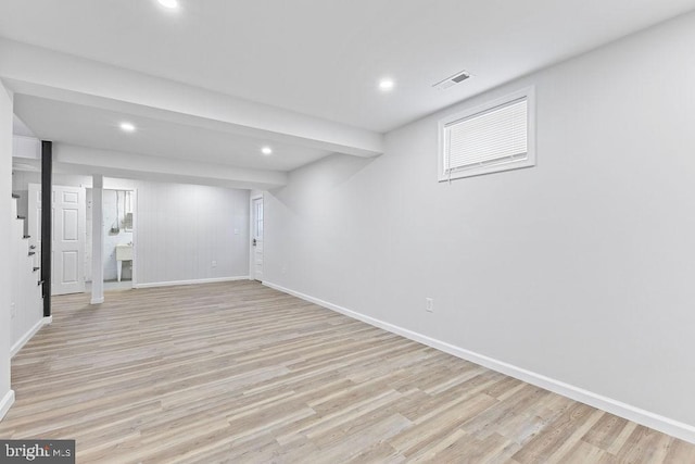 basement with light wood-type flooring