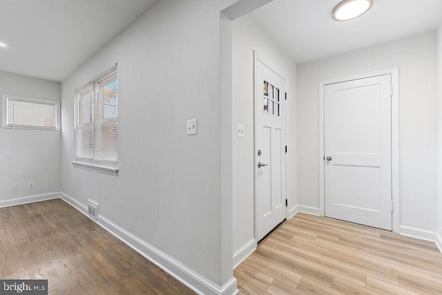 foyer entrance featuring light hardwood / wood-style flooring