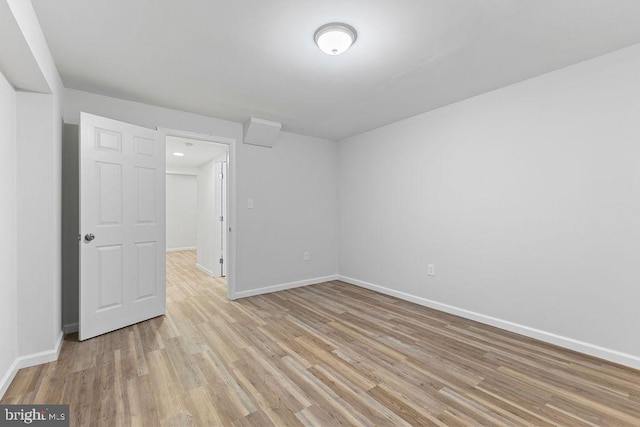 unfurnished room featuring light hardwood / wood-style floors