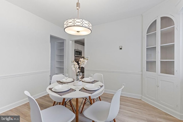 dining room featuring light hardwood / wood-style floors