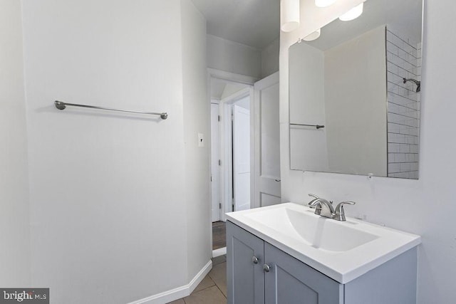 bathroom with tile patterned flooring and vanity