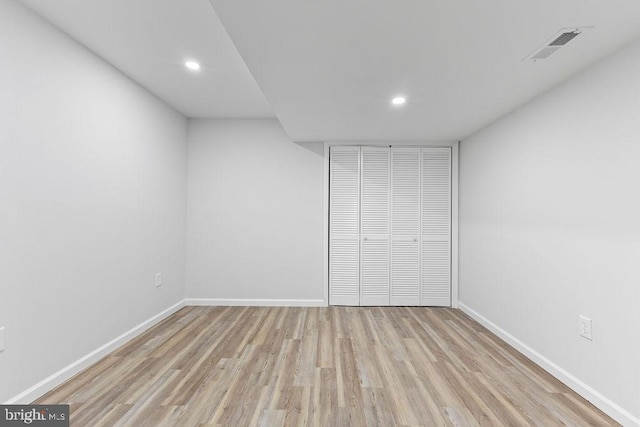 unfurnished bedroom with light wood-type flooring