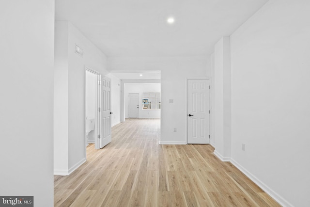 hallway featuring light wood-type flooring